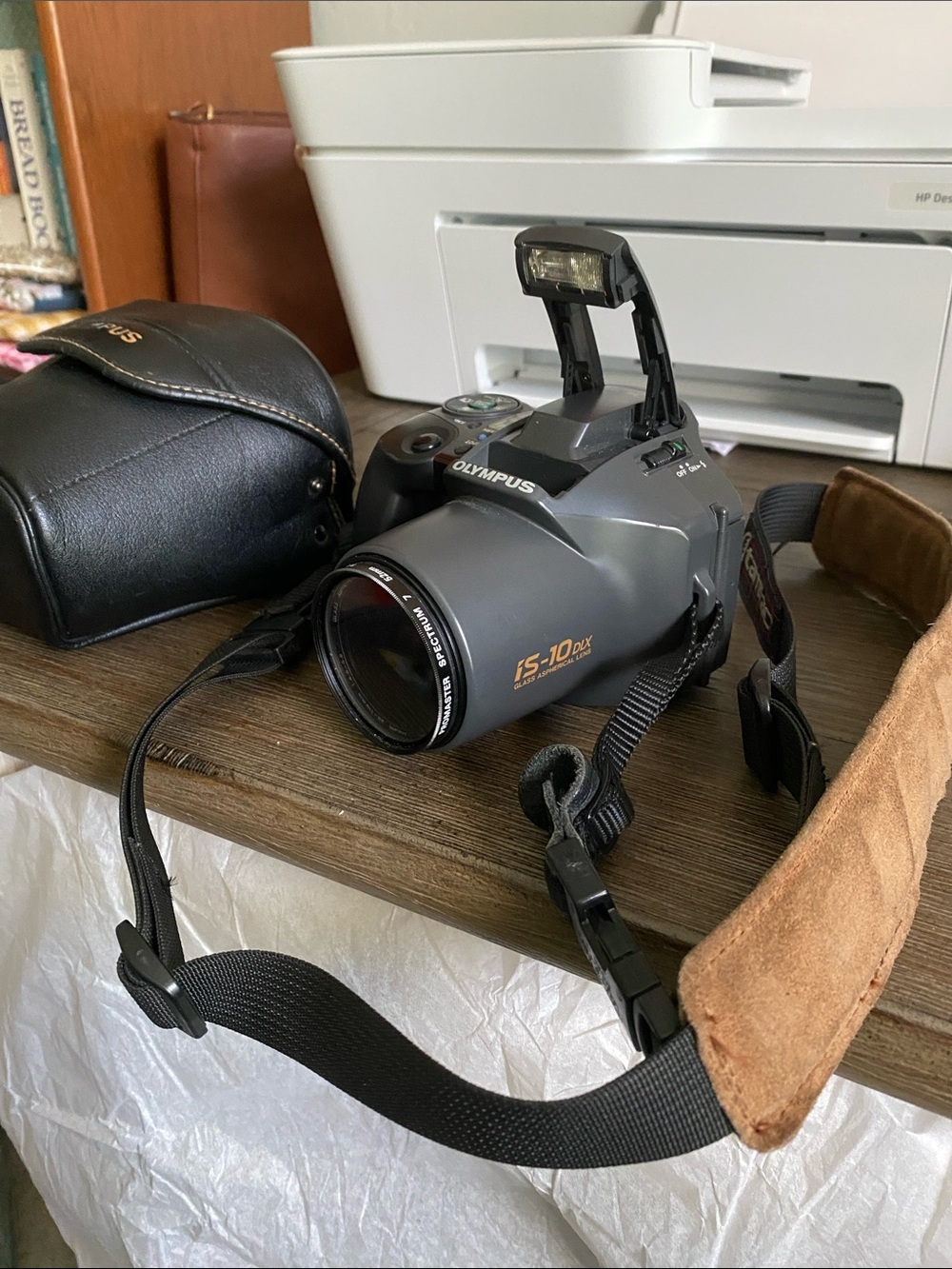 Olympus Digital Camera IS10 with Built-In Flash and Strap